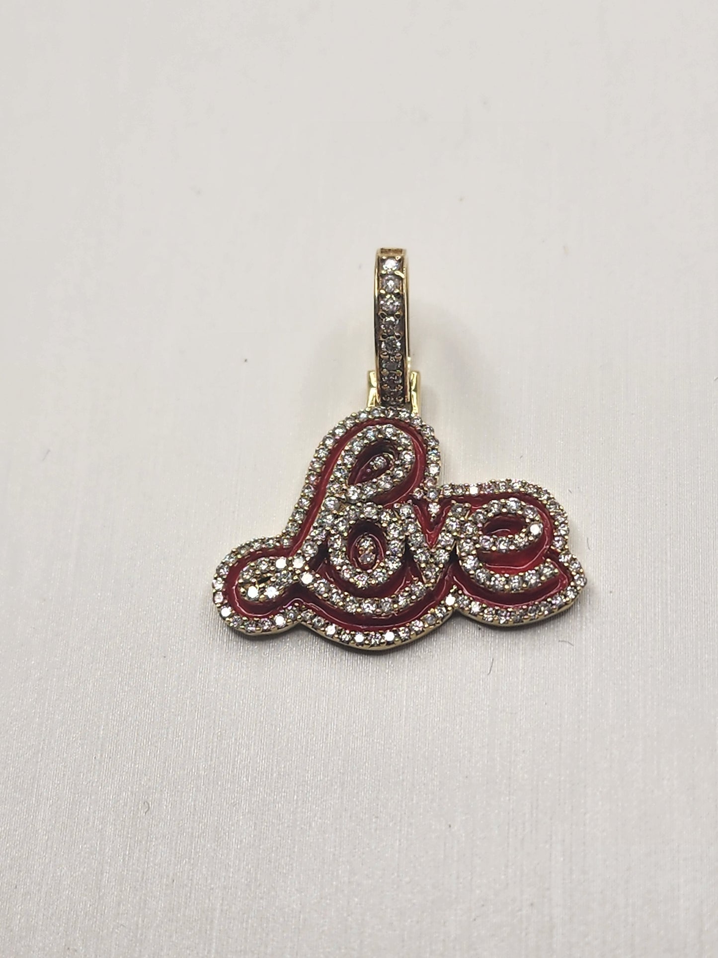"love" pendant, 10k yellow gold, 0.70 CT Si diamonds
